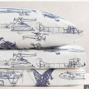 Restoration hardware baby and child airplane fitted crib sheet.
